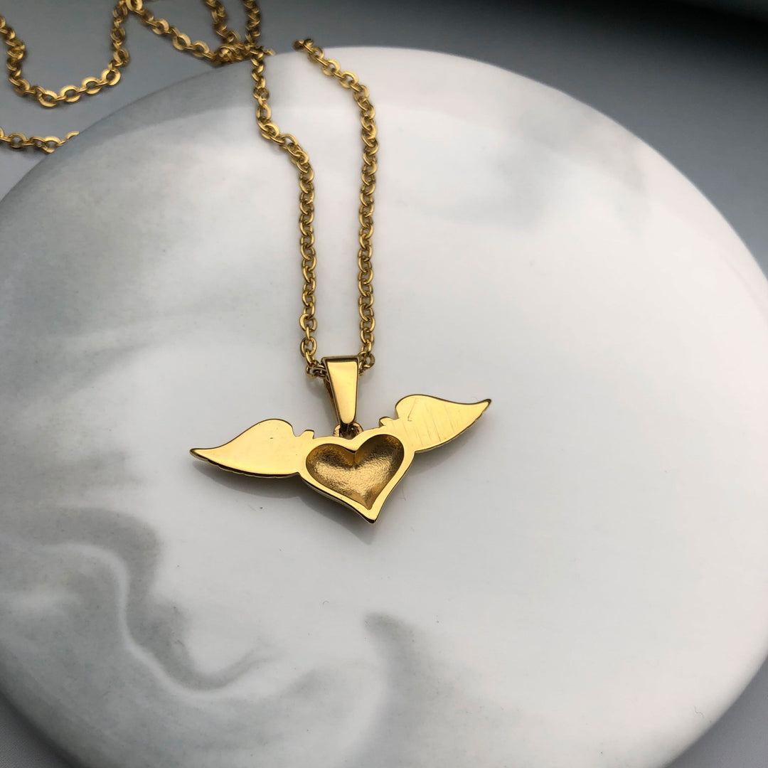 Collier Femme Cœur Ailes design symbolique